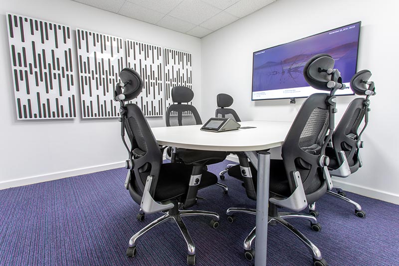 A meeting space with acoustic panels