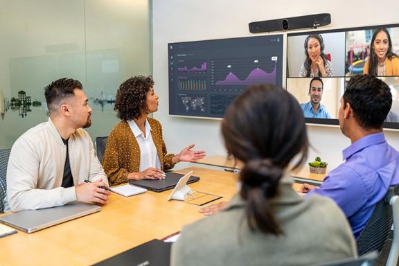 A meeting room featuring a Poly video collaboration system